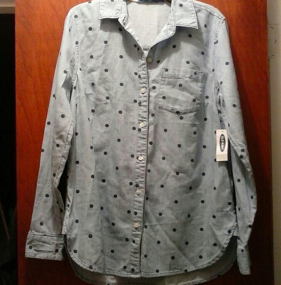 The classic debim XS shirt Is Made In Indonesia 100cotton. Thw Color Is blue.